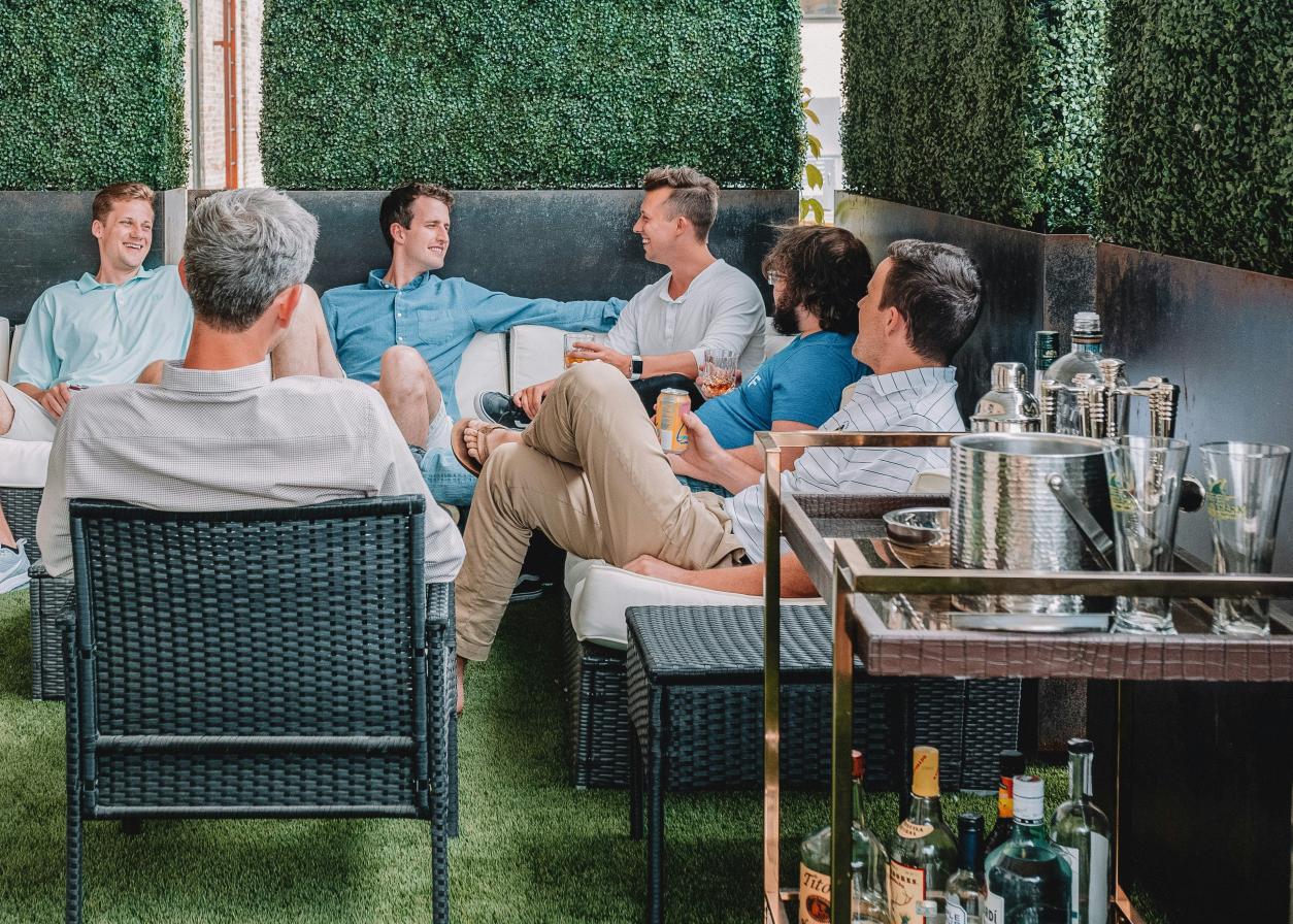 men sitting on chairs